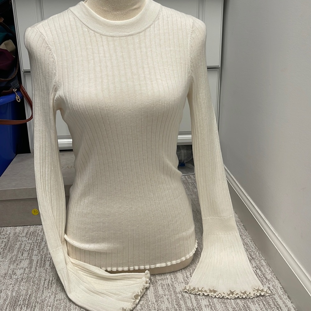 Paige “IONA sweater” ivory XS ribbed sweater w/flair sleeve and scalloped edge